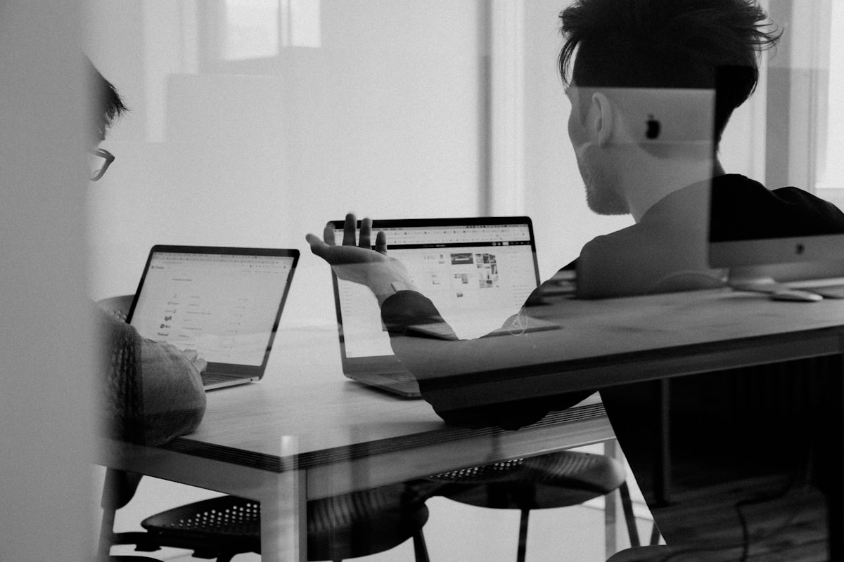 SaaS pricing news discussion among team members evaluating vendor pricing strategies and cost optimization